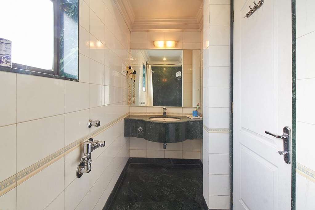 Hotel Srimaan Pune Værelse billede