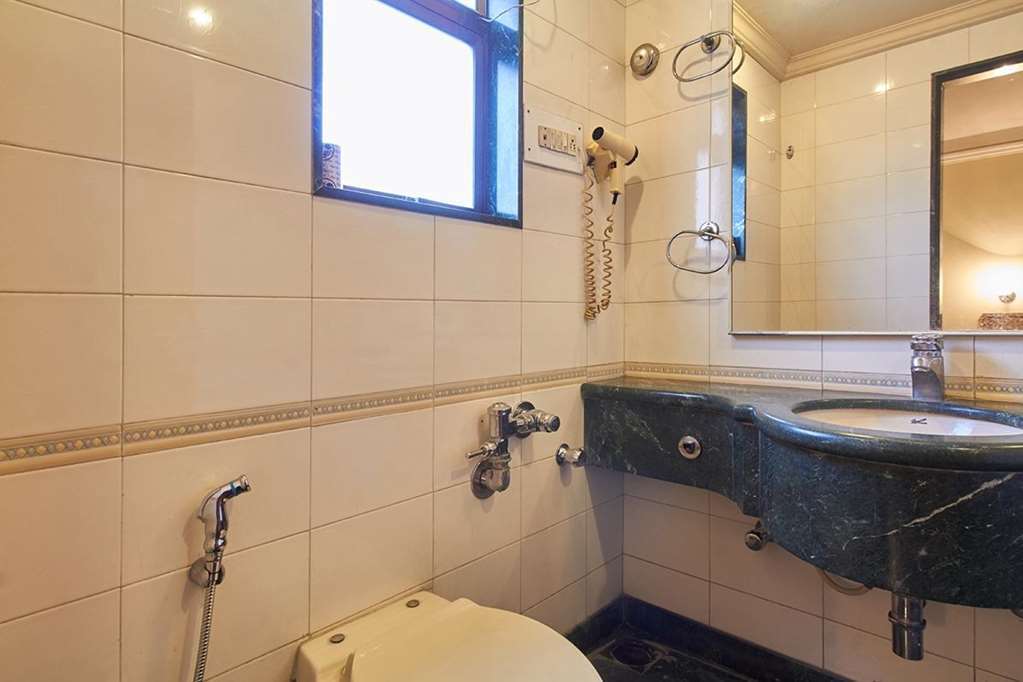 Hotel Srimaan Pune Værelse billede